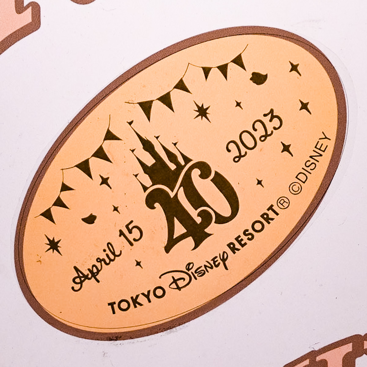 東京ディズニーリゾート40周年”ドリームゴーラウンド”スーベニアメダル　ロゴ