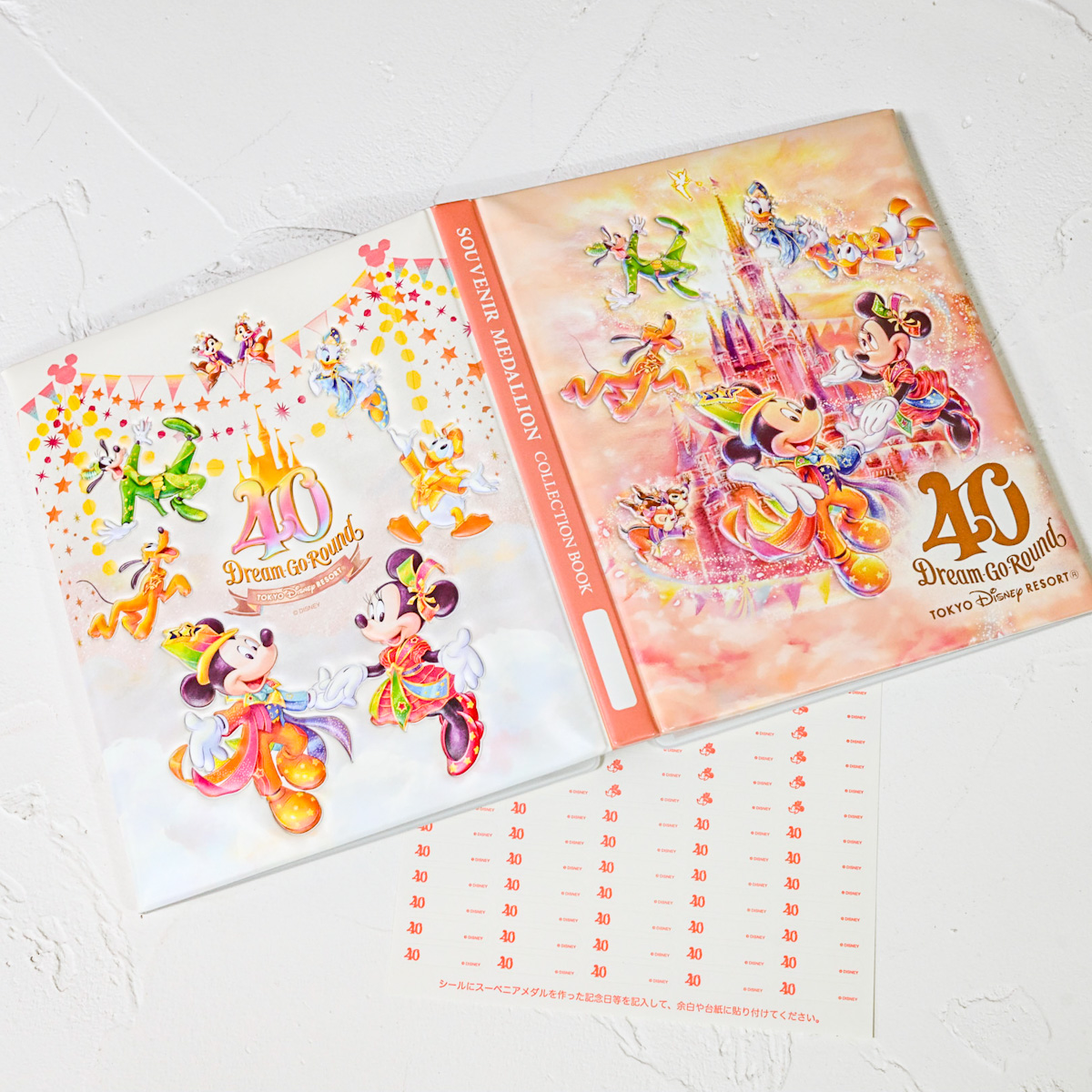 スーベニアメダルブック 東京ディズニーリゾート40周年デザイン