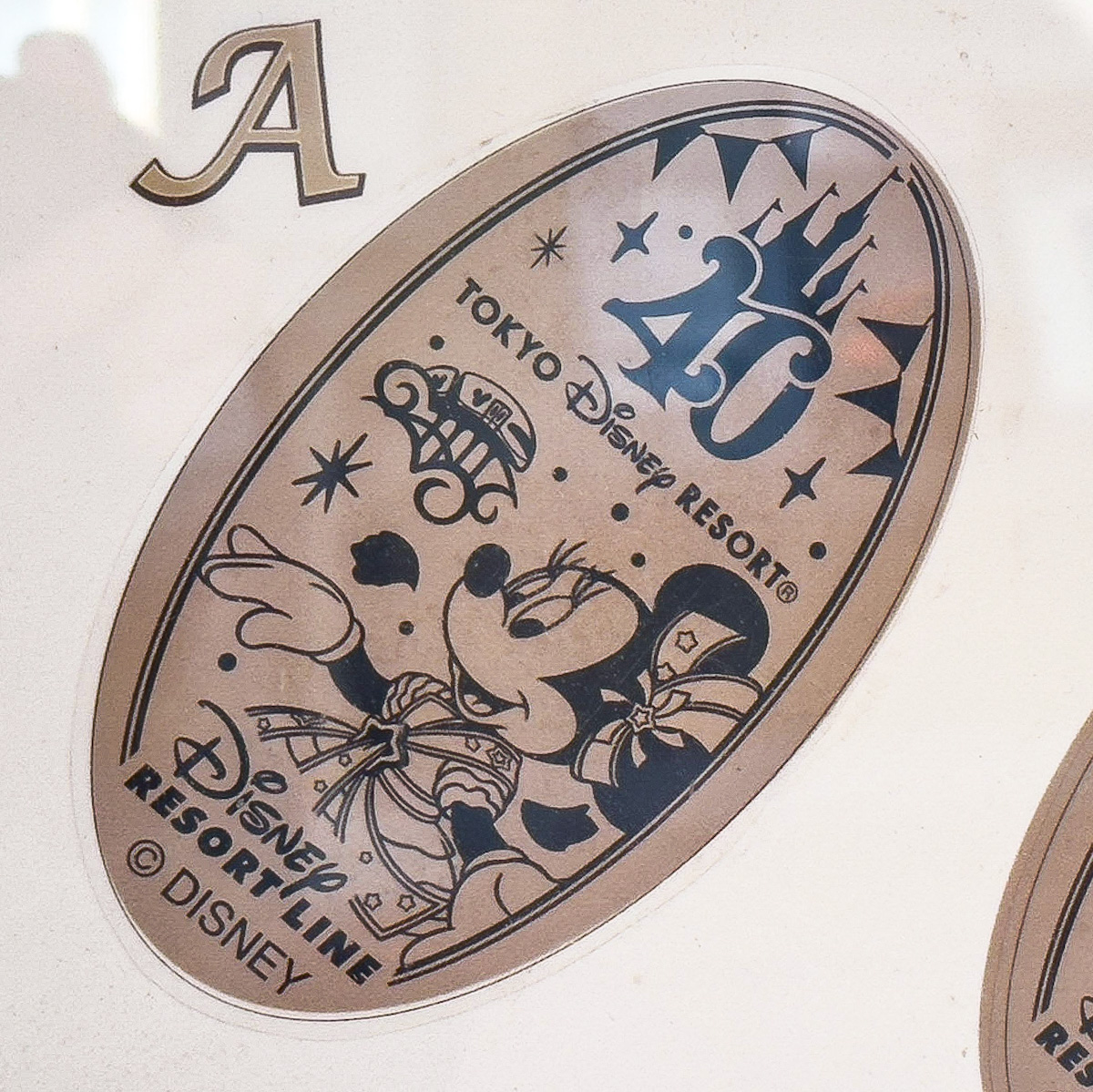 「東京ディズニーリゾート40周年”ドリームゴーラウンド”」デザインスーベニアメダル　東京ディズニーランド・ステーション　ミニーマウス