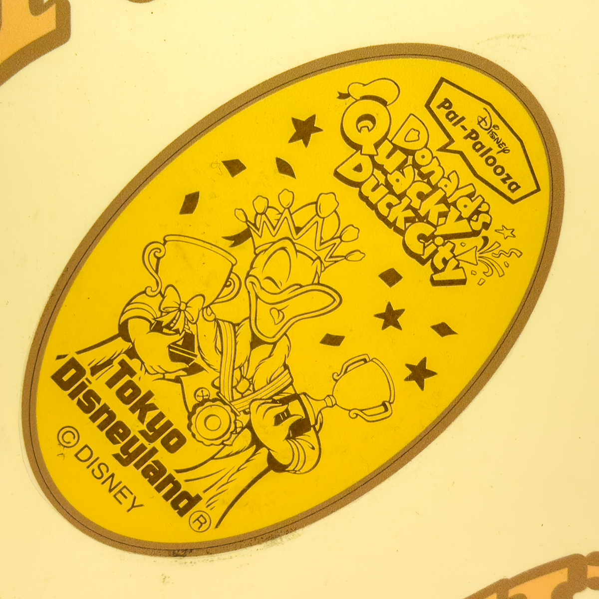 東京ディズニーランド「ディズニー・パルパルーザ”ドナルドのクワッキー・ダックシティ”」スーベニアメダル　ドナルドダックデザイン