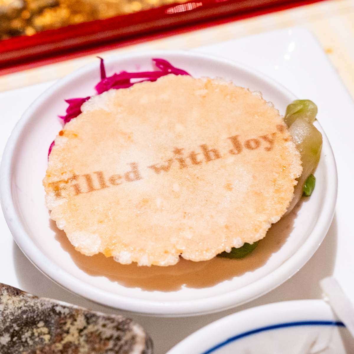 チーズクラッカー、ザーサイと紫キャベツ