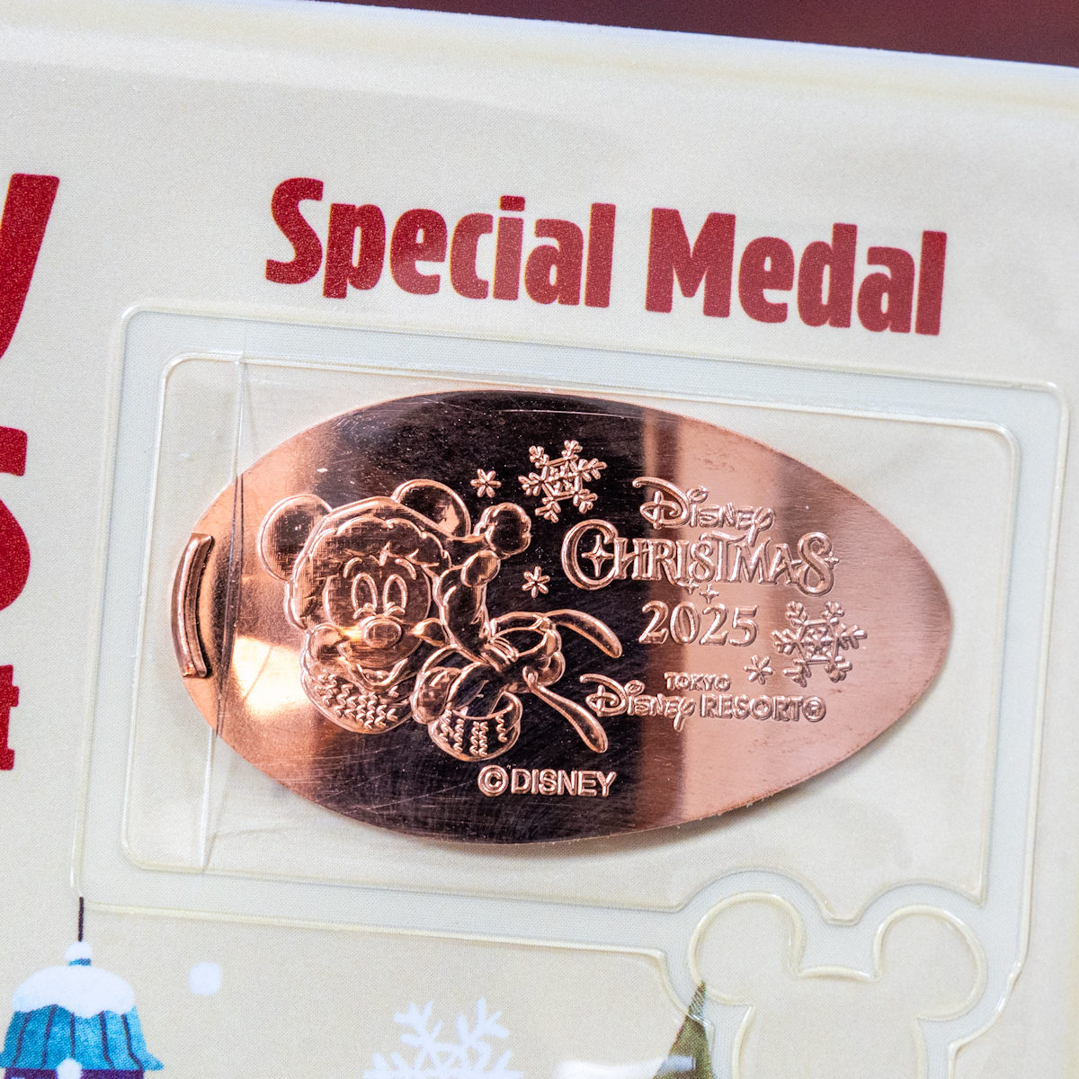 東京ディズニーリゾート"ディズニー・クリスマス2025"グッズ(スーベニアメダルブック)スーベニアメダル