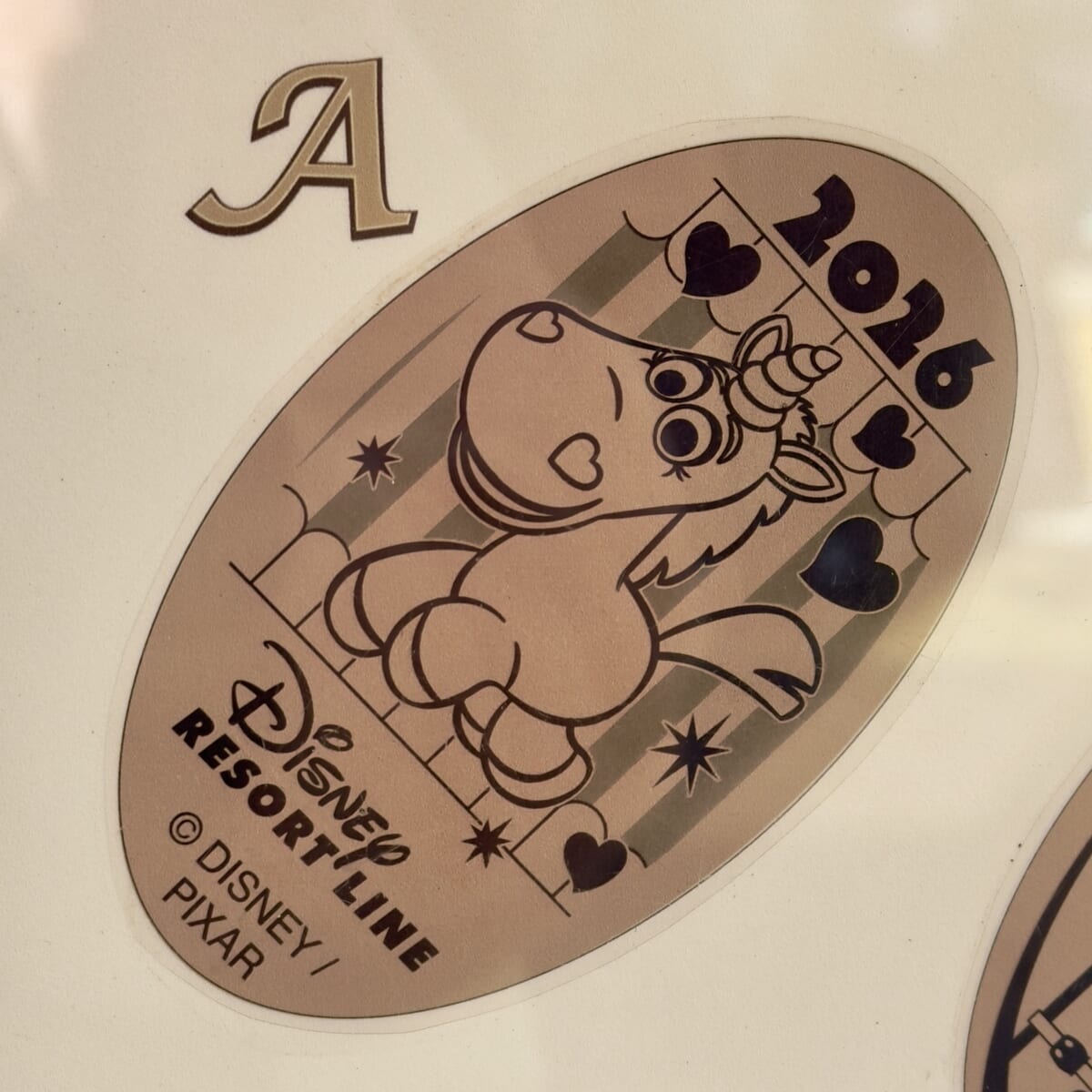 ディズニーリゾートライン”2026”イヤリースーベニアメダル　ディズニーリゾートライナー　バターカップ