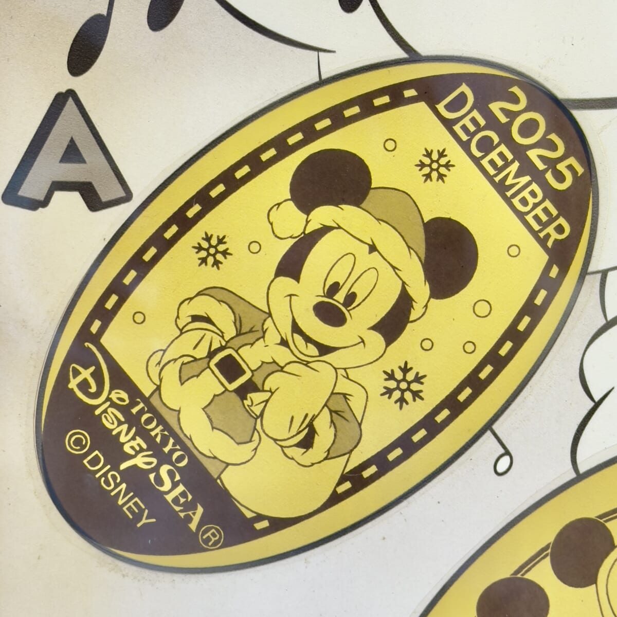 2025年12月サンタミッキーマンスリースーベニアメダル