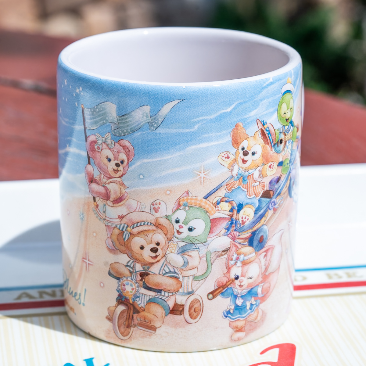 「ダッフィー＆フレンズのファインド・ユア・ビューティフル・ブルー」紅茶パンナコッタ＆ミルクムース、スーベニアカップ付き　カップ